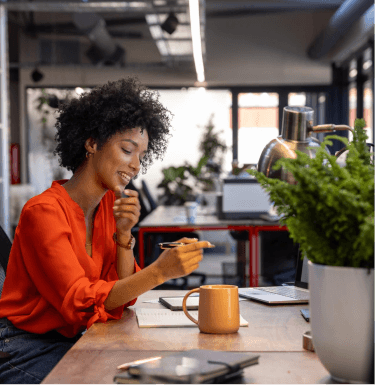 Professional working at a desk in a modern office